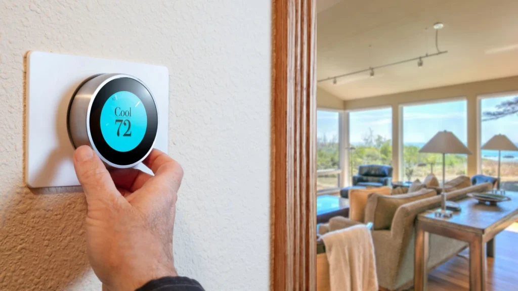 Smart thermostat installation in an Ontario home showing wiring connection to HVAC system